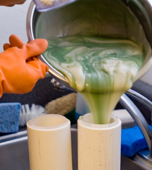 pouring fresh soap into a mold